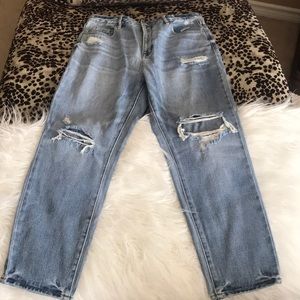 Mom jeans. High waist. Distressed. On trend